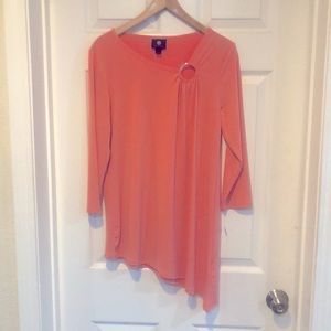 Gorgeous color , coral! Never been worn! Asymmetrical design very attractive on!